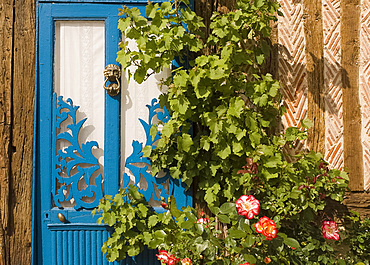 A blue painted door, Normandy, France, Europe