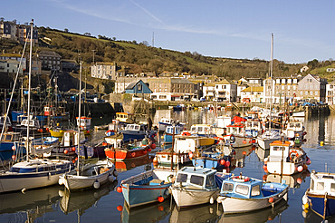 Colourful old wooden fishing boats in the harbour, Mevagissey, Cornwall, England, United Kingdom, Europe