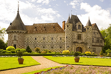 The chateau of St.-Germanine-de-Livet with a colourful checked facade and gardens, Normandy, France, Europe