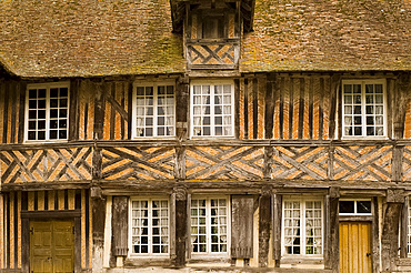 The half timbered manoire and surrounding moat in Coupesarte, Normandy, France, Europe