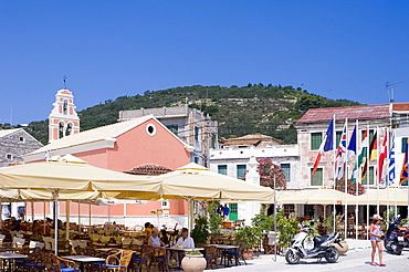 The main square with a church and tavernas in Gaios, Paxos, Ionian Islands, Greek Islands, Greece, Europe