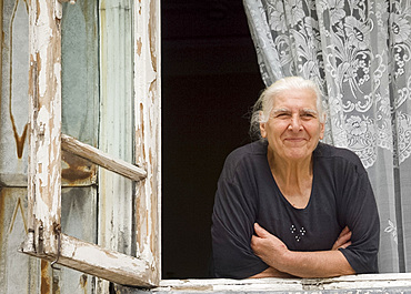 An old lady looking out her window, Batumi, Georgia, Eurasia