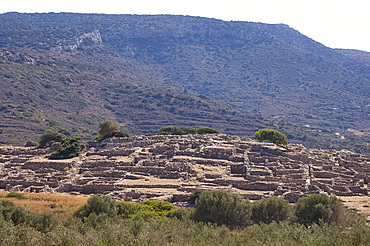 Low stone walls at the ancient Minoan town of Gournia above the Gulf of Mirambellou, Crete, Greek Islands, Greece, Europe