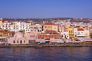 A view of tavernas around the harbour and the Kutchuk Hasan Mosque in the old town section of Hania, Crete, Greek Islands, Greece, Europe