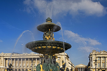 An ornate gilded fountain and statues in the Place de la Concorde, Paris, France, Europe