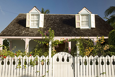 A traditional clapboard house with picket fence in Dunmore Town, Harbour Island, The Bahamas, West Indies, Central America