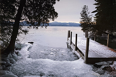 Ice around a dock on Lake George in winter, Lake George, The Adirondacks, New York State, United States of America, North America