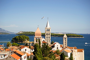 Medieval bell towers and terracotta roofs in Rab Town, island of Rab, Kvarner region, Croatia, Europe