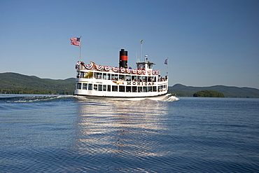 The Mohican, a sightseeing excursion boat heading toward Dome Island on Lake George, Adirondack Mountains, New York State, United States of America, North America