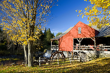 The old mill and waterfall surrounded by autumn leaves, Weston, Vermont, New England, United States of America, North America