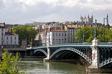 The Pont de l'Universite over the River Rhone and the Lyon skyline, Lyon, France, Europe