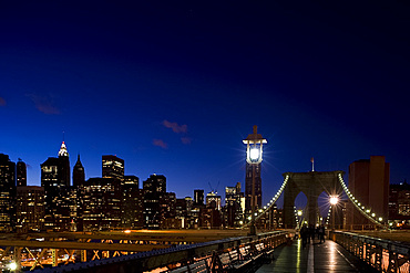 The Brooklyn Bridge and New York City skyline at dusk, New York City, New York State, United States of America, North America