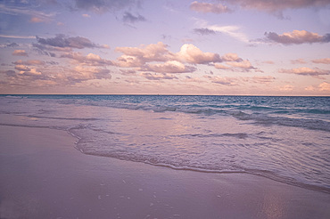 Clouds at sunset over Pink Sands Beach, Harbour Island, Eleuthera, The Bahamas, West Indies, Atlantic, Central America