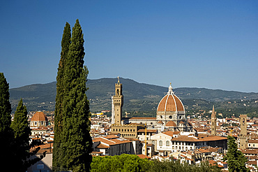 A view over teracotta rooftops to the Duomo and Campanile, Florence, UNESCO World Heritage Site, Tuscany, Italy, Europe