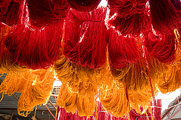 Brightly coloured wool hanging to dry in the dyers souk, Marrakech, Morocco, North Africa, Africa