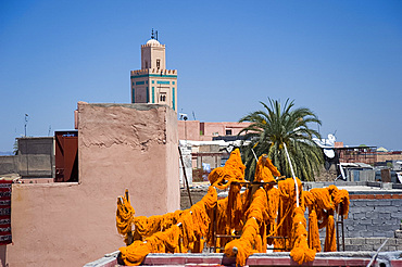 Brightly coloured wool hanging to dry in the dyers souk, Marrakech, Morocco, North Africa, Africa