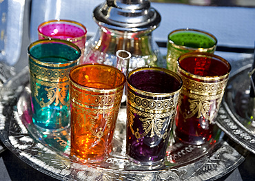 A set of colourful tea glasses for sale in the souk, in Marrakech, Morocco, North Africa, Africa