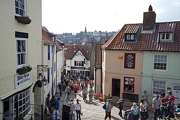 Tourists on the streets of Whitby on a summer day, Yorkshire, England, United Kingdom, Europe