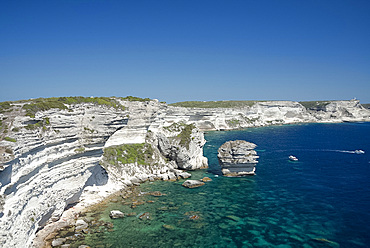 White limestone cliffs above emerald sea in Bonifacio, Corsica, France, Mediterranean, Europe