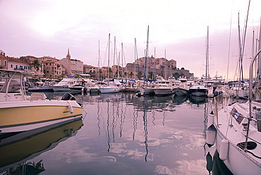 Yachts in the harbour below the citadel in the town of Calvi in the Haute-Balagne region of Corsica, France, Mediterranean, Europe