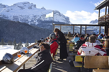 Colourful afternoon drinks at a mountain restaurant at the Alta Badia ski area, Corvara, The Dolomites, South Tyrol, Italy, Europe