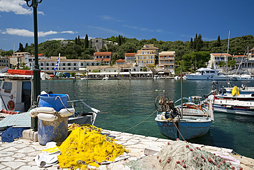 Boats in the harbour in Kassiopi on the northeast coast of Corfu, The Ionian Islands, Greek Islands, Greece, Europe