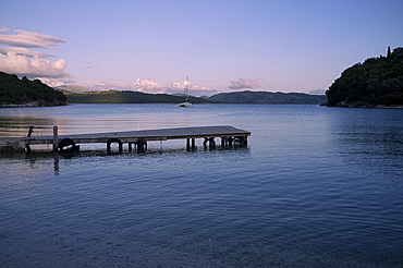 The bay at Agios Stefanos on the northeast coast of the island at sunset, Corfu, Ionian Islands, Greek Islands, Greece, Europe