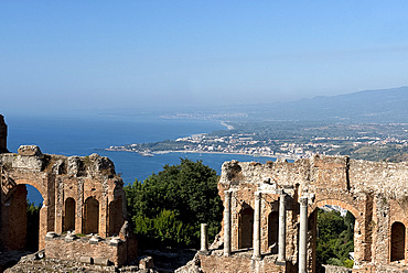 A view of the Greek Theatre and Naxos Bay on the Ionian Sea from Taormina, Sicily, Italy, Mediterranean, Europe