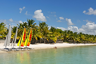 Colourful sailboats on the beach at Trou aux Biches on the north west coast of Mauritius, Indian Ocean, Africa