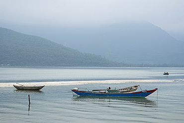 Wooden fishing boats in Lap An Lagoon, Thura Thien Hue Province, Vietnam, Indochina, Southeast Asia, Asia