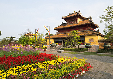 Multicoloured flowers to celebrate the Tet holiday at the Hien Lam Pavilion in the Imperial City, the Citadel, UNESCO World Heritage Site, Hue, Vietnam, Indochina, Southeast Asia, Asia