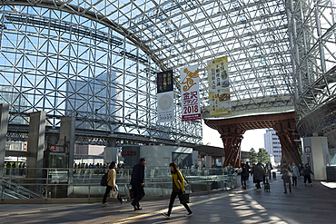 A wooden gate and steel and glass roof at the east entrance to the Kanazawa JR railway station, Kanazawa, Ishigawa, Japan, Asia