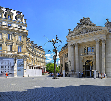 Grand entrance to the Fondation Pinault in the Bourse de Commerce, Paris. The bronze sculpture of a tree bearing rocks is by Arte Povere sculptor Giuseppe Penone