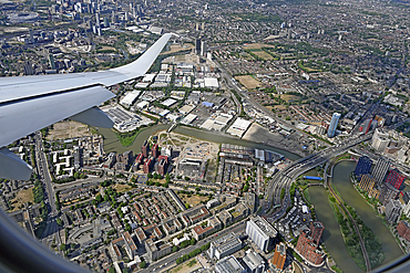 East India Dock Road crossing Bow Creek on the River Lea with the London Stadium and Stratford at the top