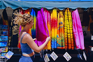 Colourful clothes hanging in a shop, St. Lucia, Windward Islands, West Indies, Caribbean, Central America