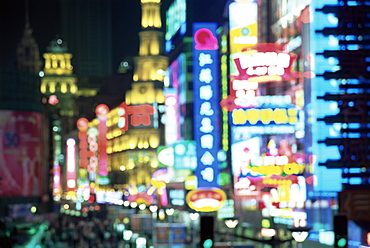 Blurred neon lights at night, Nanjing Dong Lu new pedestrian street, Nanjing Road, Shanghai, China, Asia