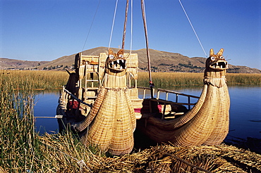 Two traditional reed boats, floating islands, Islas Flotantes, Lake Titicaca, Peru, South America