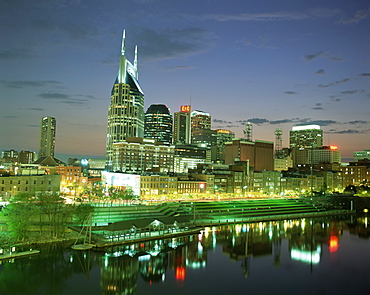 City skyline and Cumberland river at dusk, Riverfront Park, Nashville, Tennessee, United States of America, North America