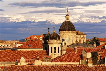 Elevated view over the Old Town tiled rooftops to the cathedral, Dubrovnik, UNESCO World Heritage Site, Dalmatia, Croatia, Europe