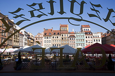 Colourful houses of the Old Town Square (Rynek Starego Miasto) viewed through a cafe window, Old Town (Stare Miasto), UNESCO World Heritage Site, Warsaw, Poland, Europe