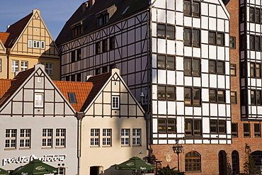 Restored warehouses along the Stara Motlawa river (Mottla River), Gdansk, Pomerania, Poland, Europe