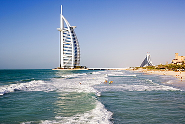 The iconic symbol of Dubai, the Burj Al Arab, the world's first seven star hotel (classified as five star deluxe), built on an artificial island offshore from the Jumeirah Beach Hotel, Dubai, United Arab Emirates, Middle East