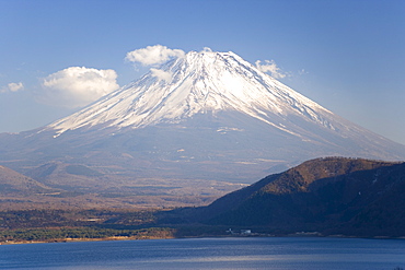 Mount Fuji, 3776m, viewed across Mototsu-Ko, one of the lakes in the Fuji Go-ko (Fuji Five Lakes) region, Honshu, Japan, Asia