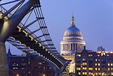 Millennium Bridge and St. Pauls Cathedral, illuminated at dusk, London, England, United Kingdom, Europe