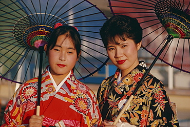 Portrait of two women wearing traditional kimonos, Japan, Asia