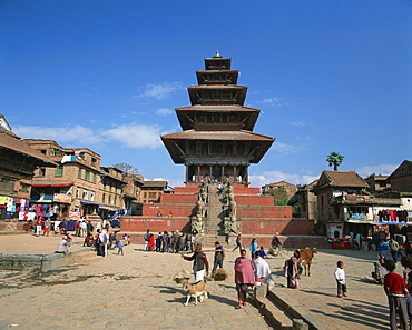 Street scene with the Siddhi Lakshmi Temple with its tiered roof, in the town of Bhaktapur, Nepal, Asia