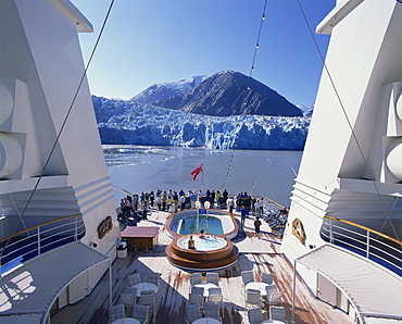 Crowds gather at stern of the M.S. Song of Flower cruise ship to see glacier, Tracy Arm, Alaska, United States of America, North America