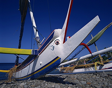 Close-up of the prow of an outrigger fishing boat on the beach in Bali, Indonesia, Southeast Asia, Asia