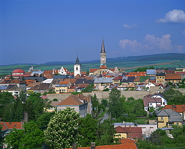 Houses and churches on the skyline of the town of Levoca, with countryside behind, in Slovakia, Europe