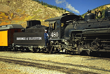 The train driver and engine of the Durango and Silverton passenger steam train, Colorado, United States of America, North America